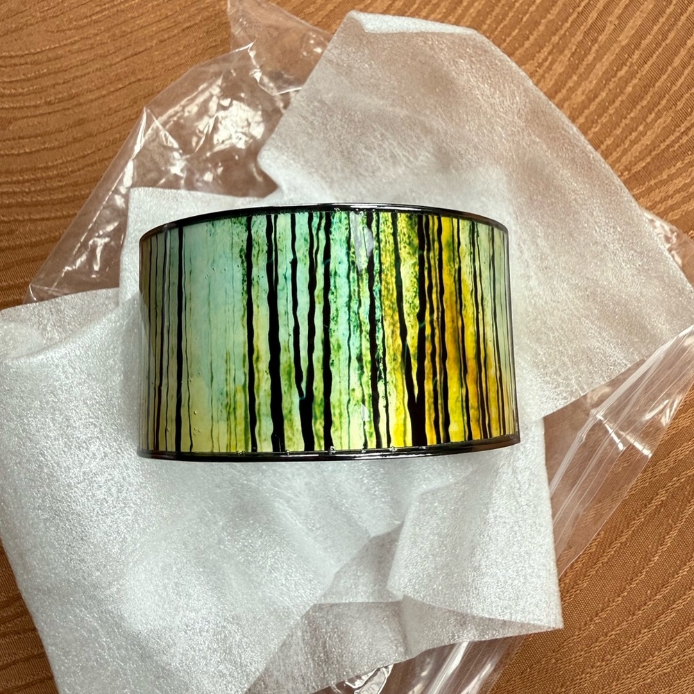 Lia Sophia “Sundown” stretch bangle w/ forest photo